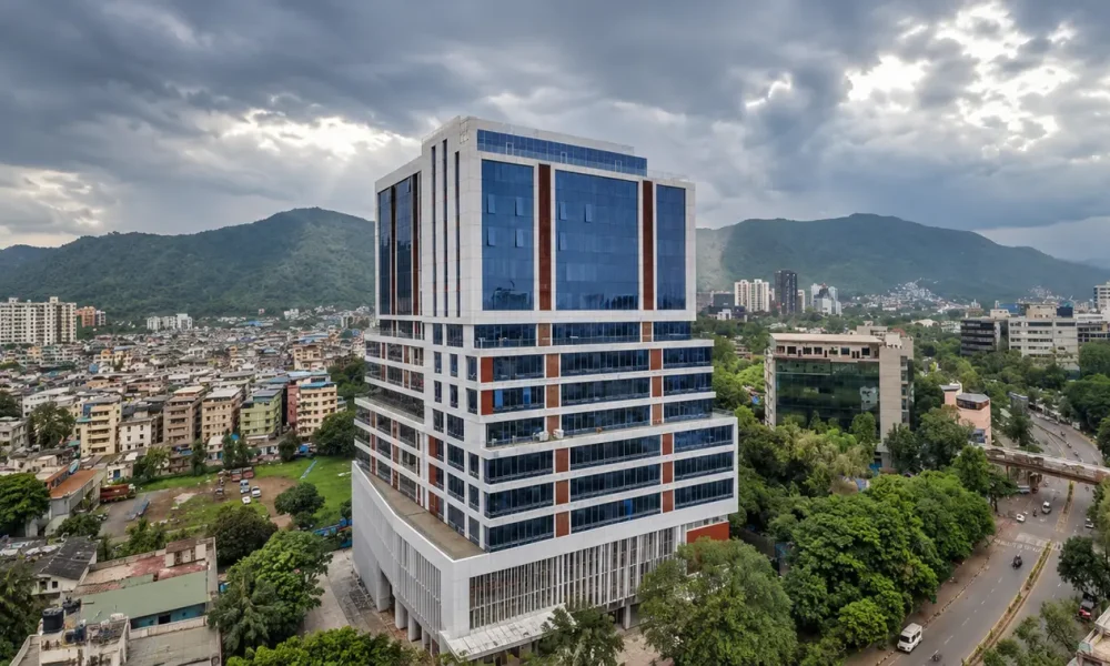 Modern Cityscape Under Mountain Skies